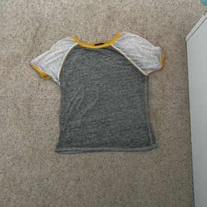 Multi colored cropped shirt.